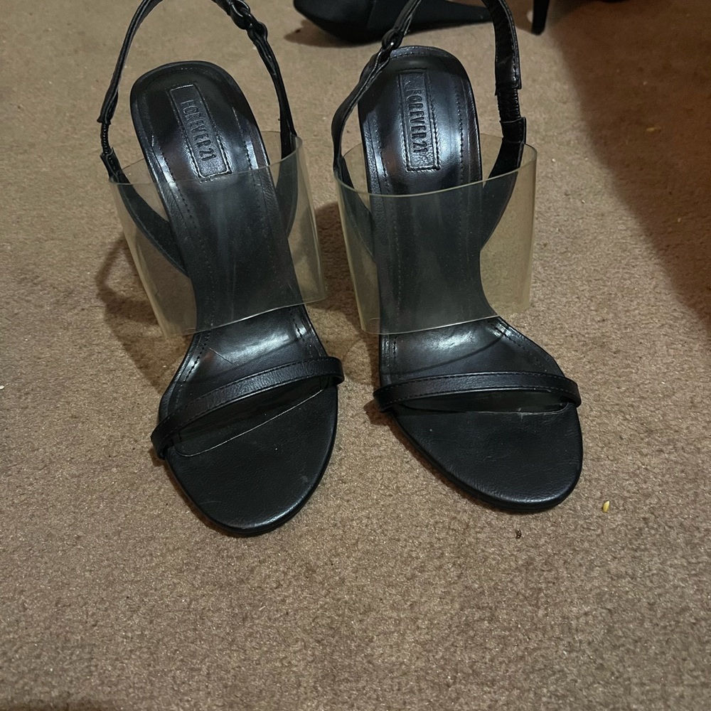 Black and clear heels